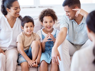 All families can benefit from therapy. Shot of a family meeting with a therapist.